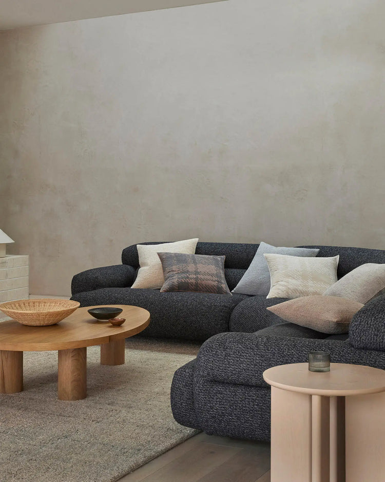 Marceau Fox wool blend rug in grey with light and dark weave detail, styled in living room setting by Weave Home
