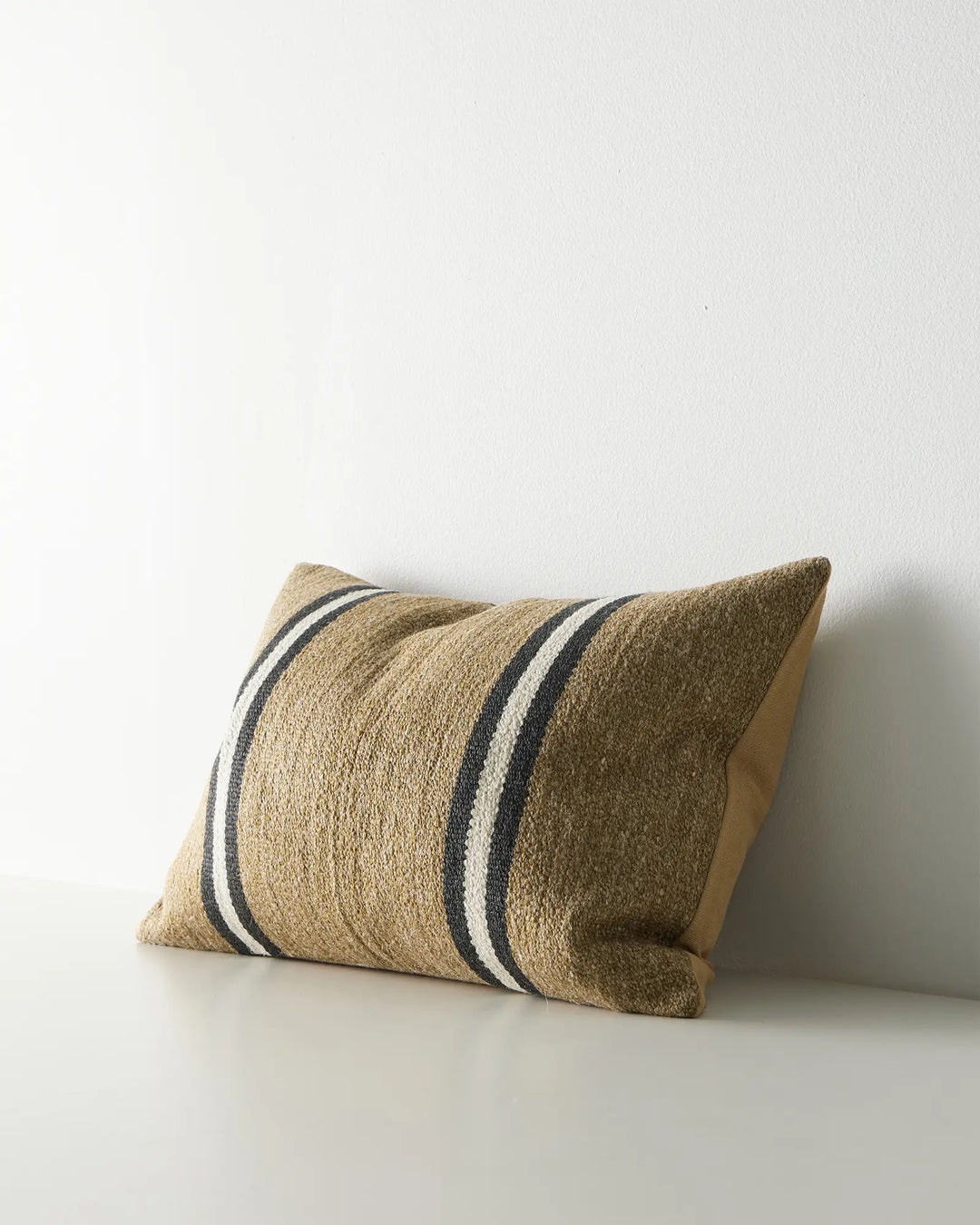 Mila Desert 40x60 lumbar cushion in warm sand wool linen blend with navy and cream striped detail by Weave Home
