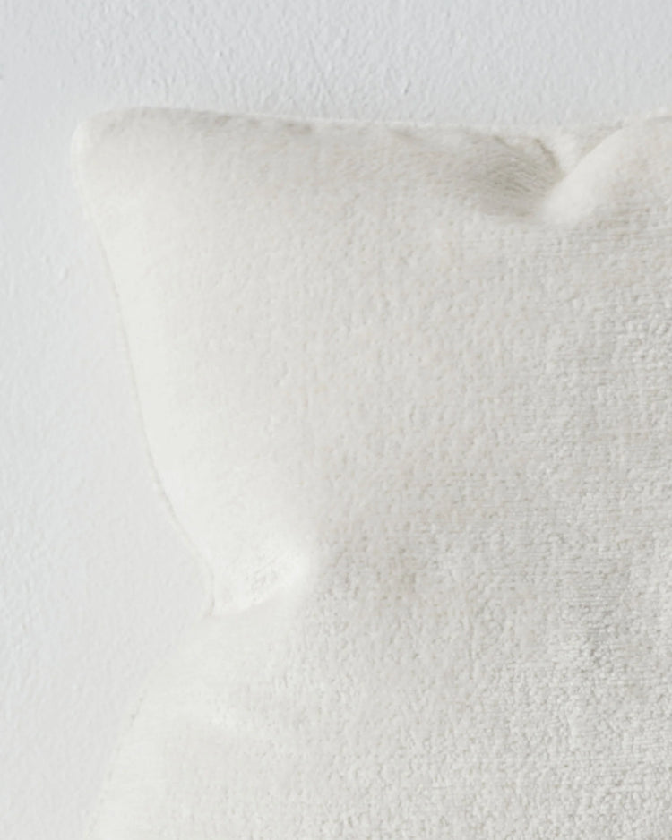 Tempo Pearl 50x50 cushion close-up, showing chunky chenille texture and piped edge detail in pristine white by Weave Home