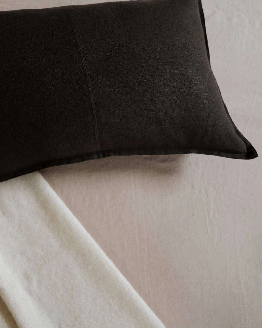 Como Ganache linen lumbar cushion in rich chocolate brown, stone-washed European linen with matte finish by Weave Home