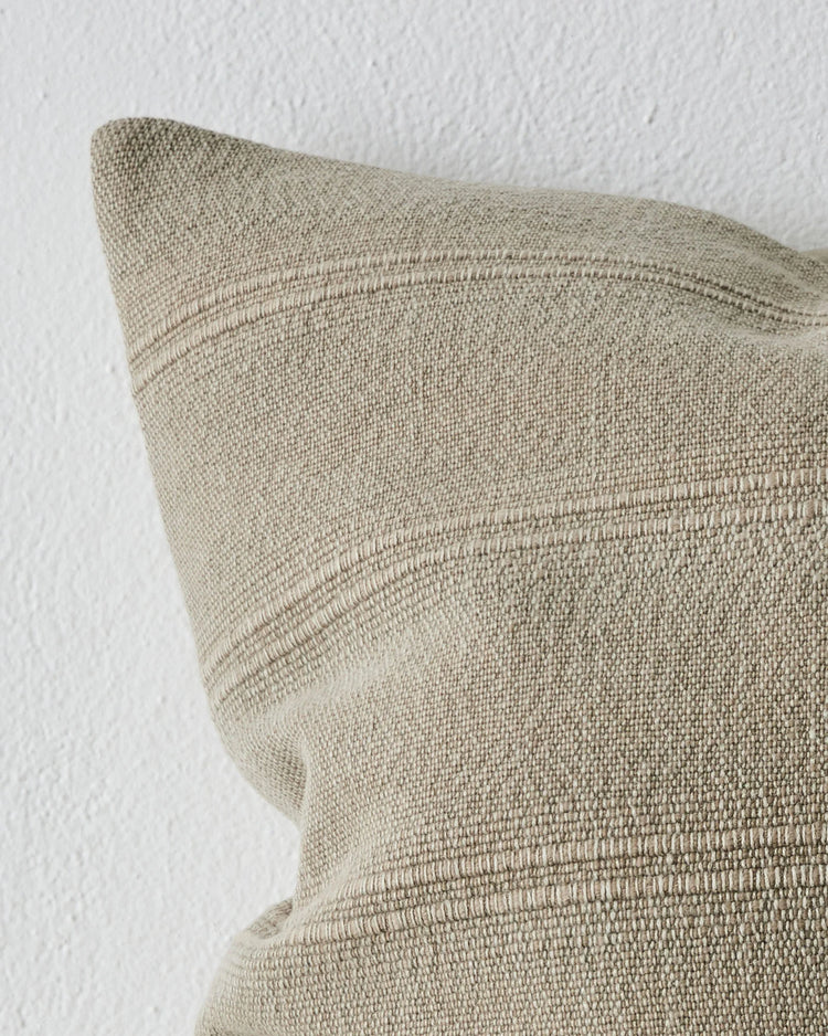 Palma Stone cushion close-up showing subtle ribbed texture in natural linen-cotton blend, 50x50cm by Weave Home