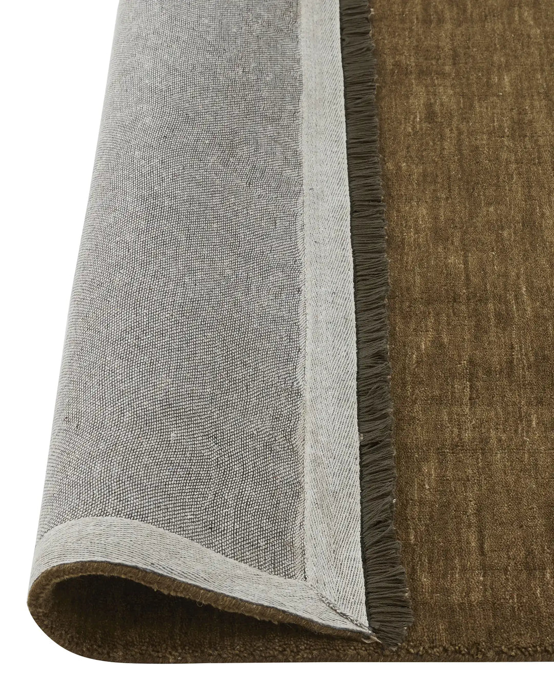Silvio Oakmoss rug detail showing micro fringe border and textured weave, sustainable styling high-traffic rug by Weave Home