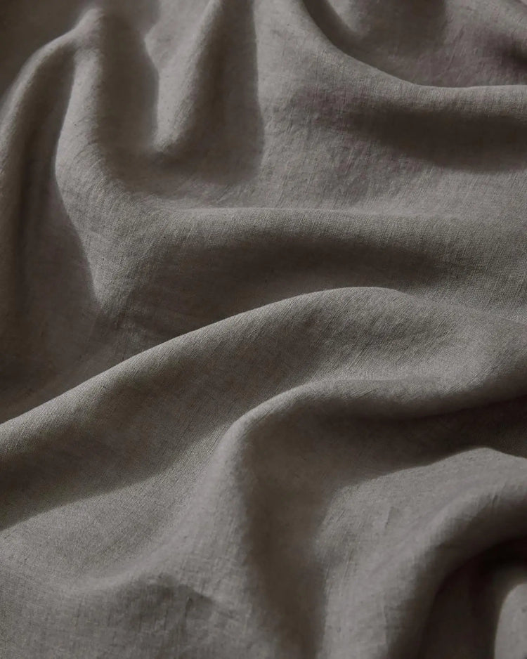 Ravello Flat Sheet in Charcoal, close-up of soft European linen weave texture by Weave Home