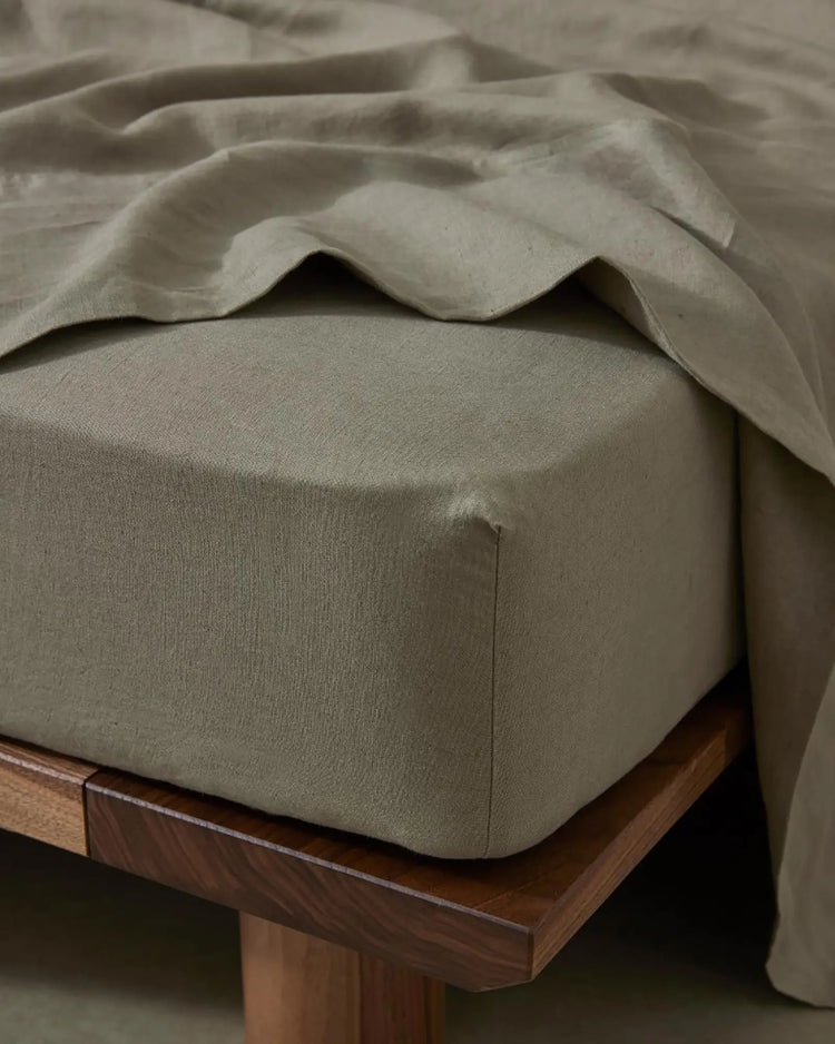 Ravello Fitted Sheet in Caper, European linen with thick elastic banding, corner detail view by Weave Home