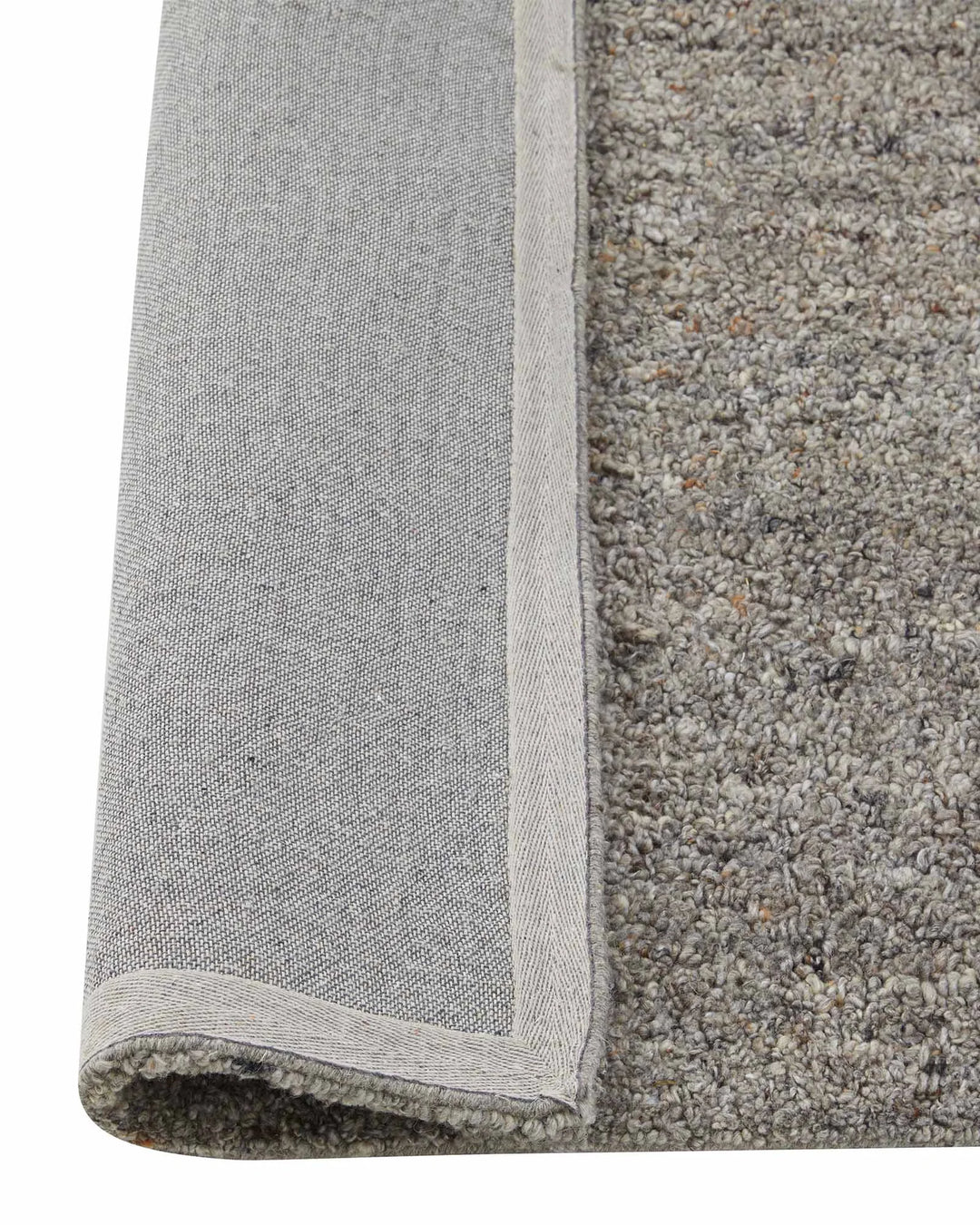 Marceau Shale rug detail, grey wool-blend high-traffic rug with bound edge and textured weave by Weave Home