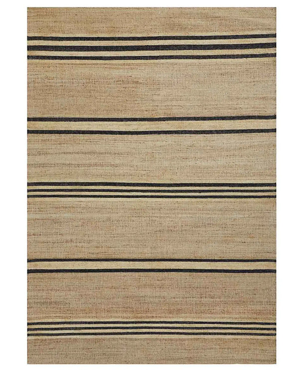 Umbra Natural jute rug with black and cream woven stripe detail, flat weave construction by Weave Home