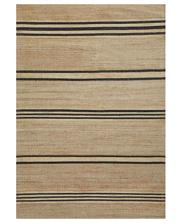 Umbra Natural jute rug with black and cream woven stripe detail, flat weave construction by Weave Home