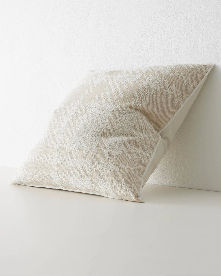 Sienne Macadamia 50x50 cushion in cream with oversized white check texture and overlocked edge by Weave Home