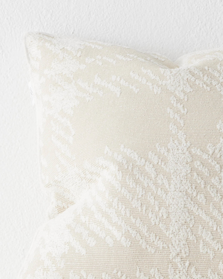 Sienne Macadamia cushion close-up, 50x50cm, cream and white oversized check texture with overlocked edge by Weave Home