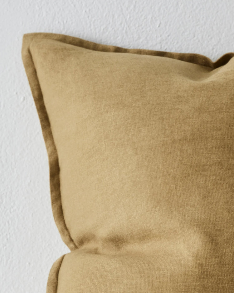 Fiore Sergeant lumbar cushion in olive linen viscose blend with soft piping detail, close-up view by Weave Home