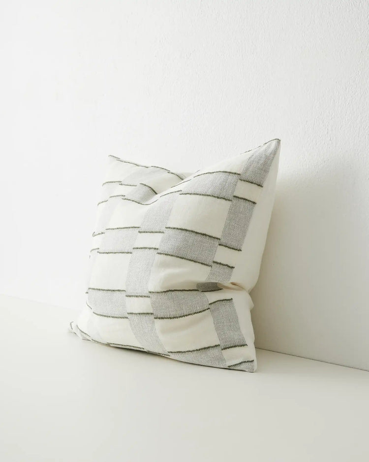 Lorenzo Olive 50cm cushion in cream and sage green woven stripes with hand-finished fringe detailing by Weave Home
