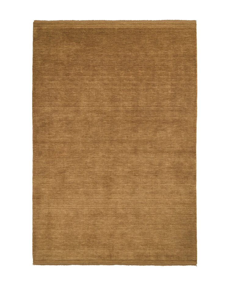 Silvio Dijon hand-woven rug in mustard yellow with textured weave and micro fringe border detail by Weave Home