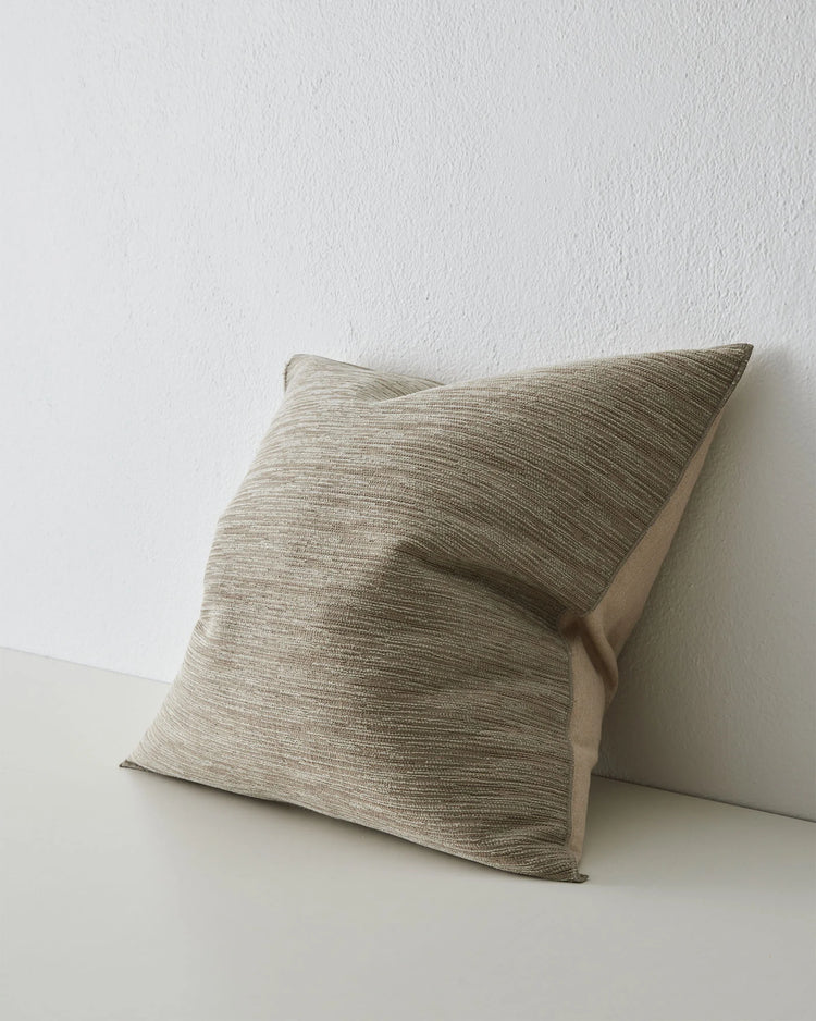 Dania Oyster 50x50 cushion with woven texture and warm two-toned finish, overlocked edge detail by Weave Home