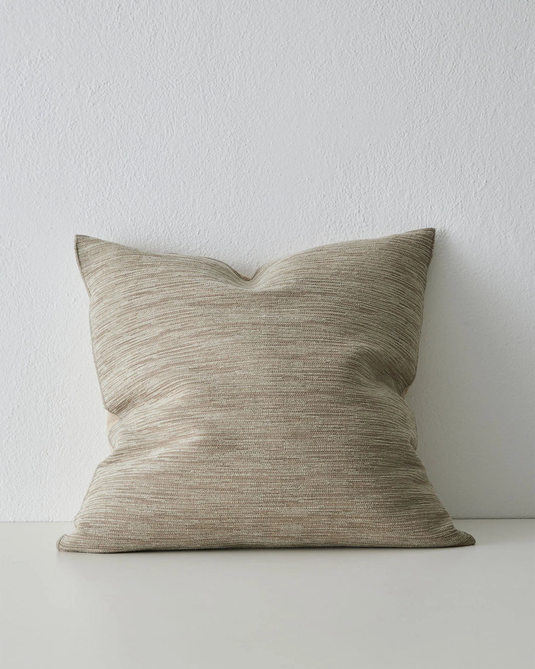 Dania Oyster 50x50 cushion, woven polyester with warm two-toned texture and metallic highlights, overlocked edges by Weave Home