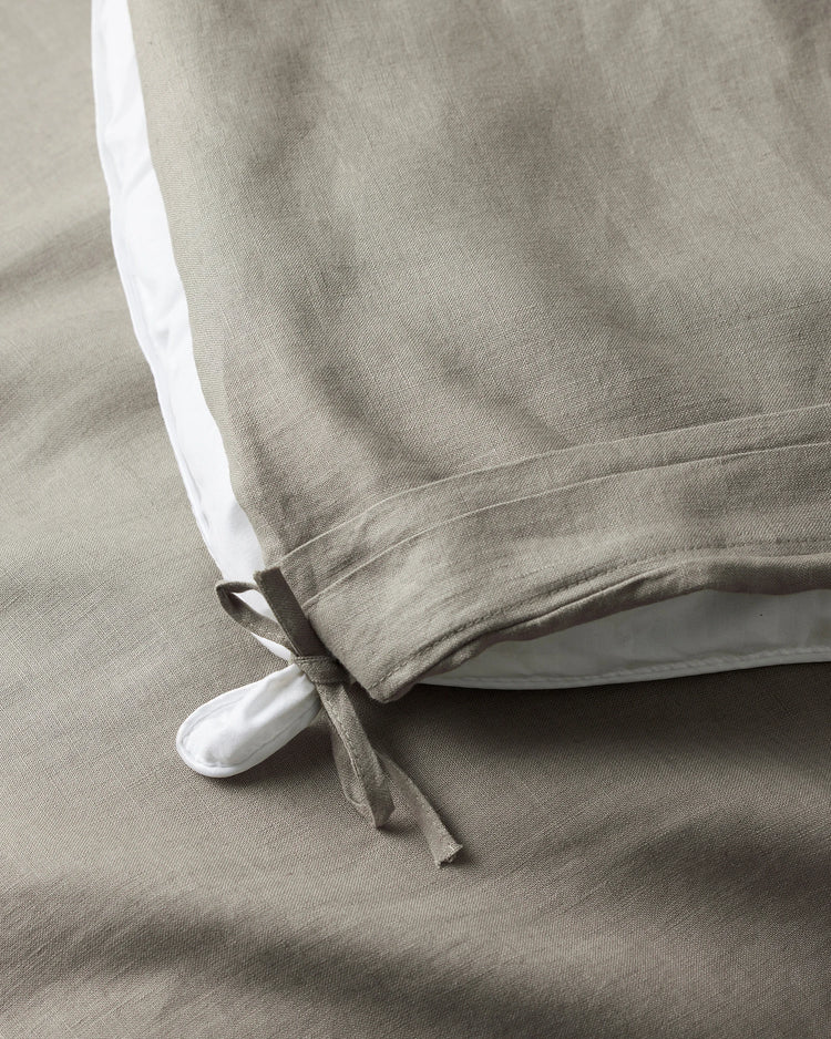 Ravello Quilt Cover in Pebble, close-up detail of white French linen ties securing inner quilt, European linen by Weave Home