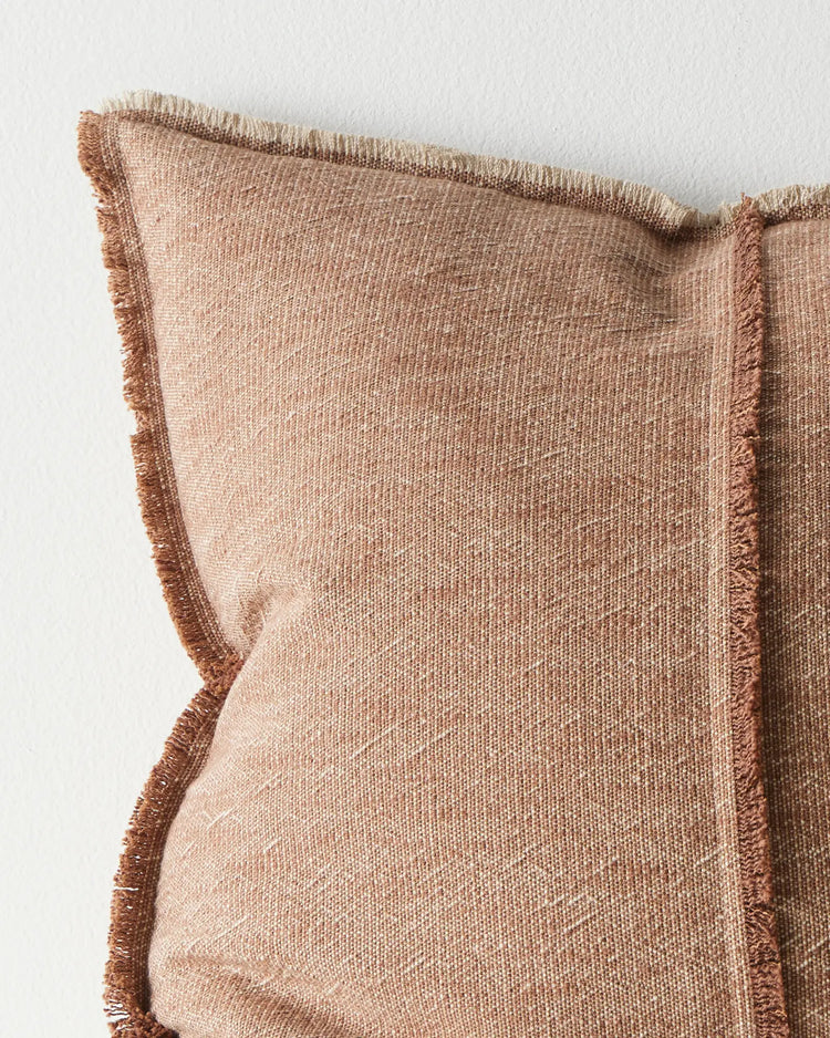 Adela Rust 50x50 cotton linen cushion, close-up of textured two-tone weave with raw-edged fringe border by Weave Home
