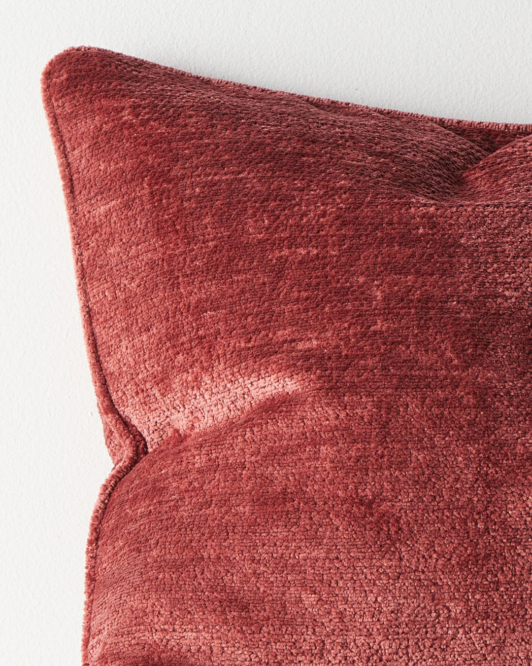 Tempo Ruby cushion close-up detail, showing soft chunky chenille texture and piped edging by Weave Home