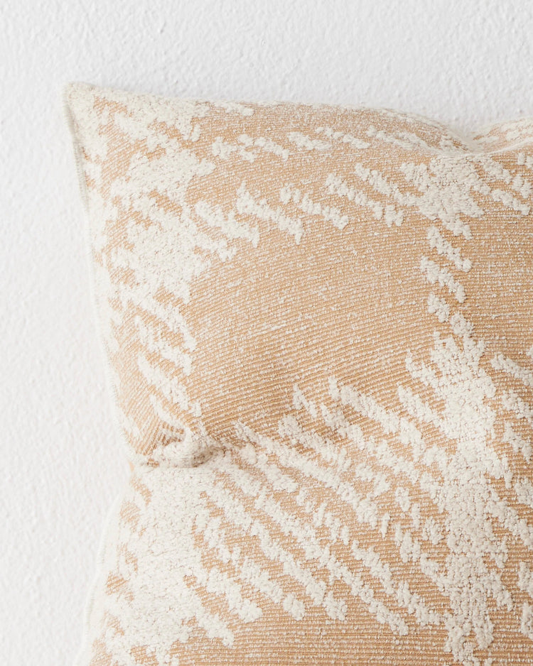 Sienne Desert 50x50 cushion close-up, golden-tan and cream oversized check weave with overlocked edge by Weave Home