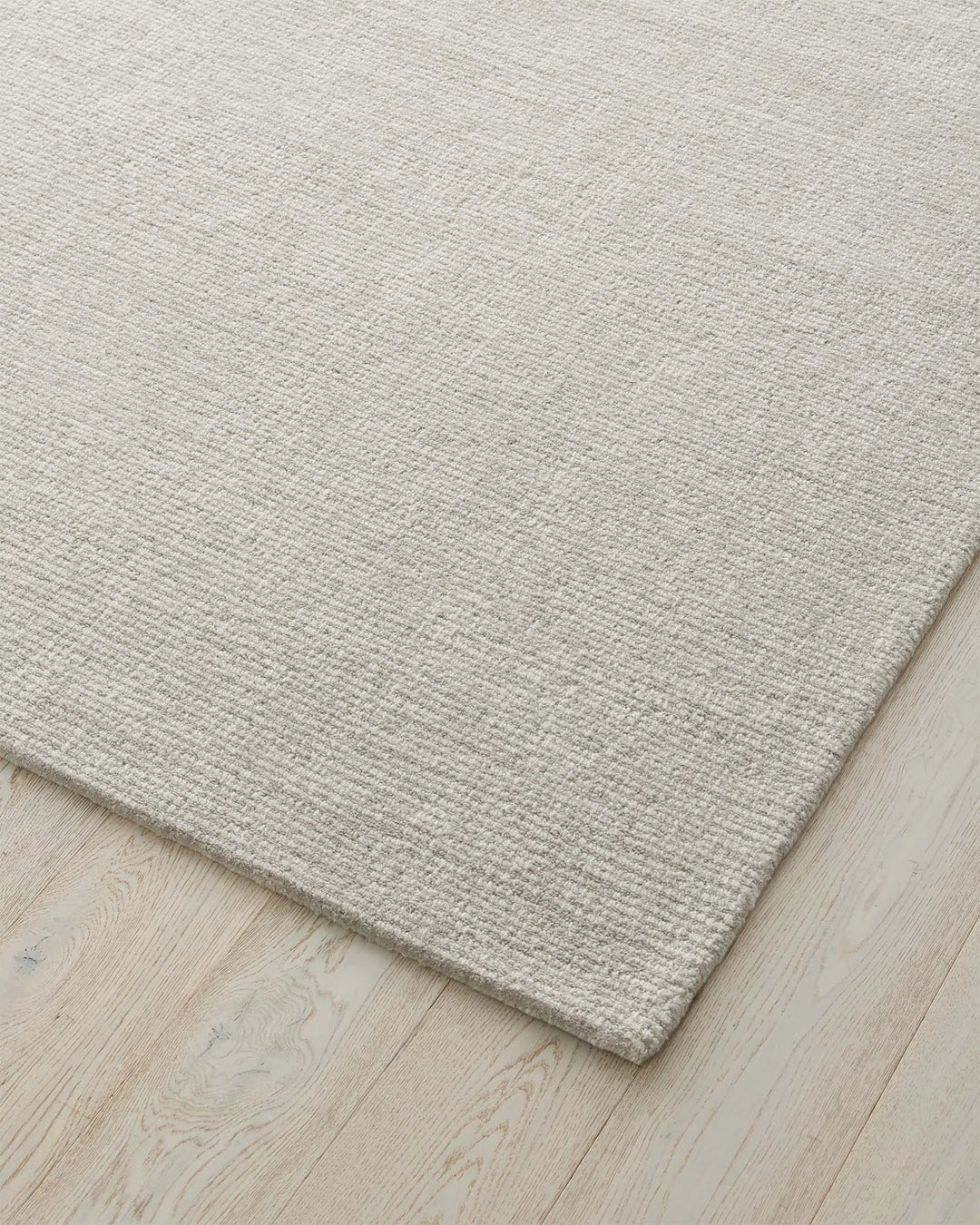 Kaia Mist textured wool rug detail, showing chunky contrast loop pile weave and cool neutral tone by Weave Home