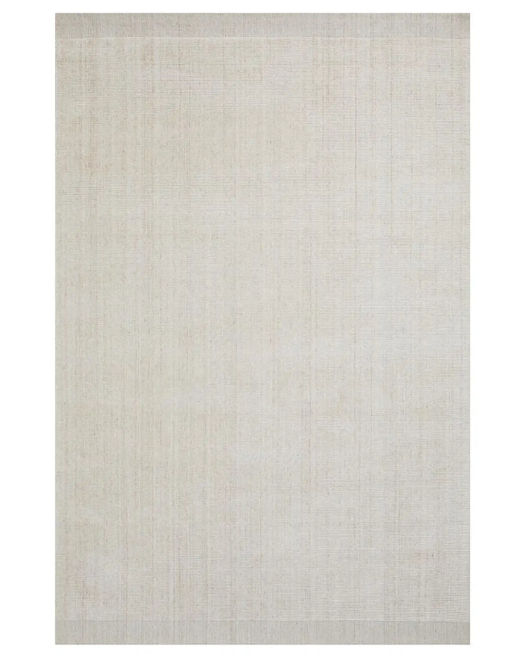 Travertine Buff low-traffic rug in viscose blend, full view showing marbled textured weave in warm neutral tone by Weave Home
