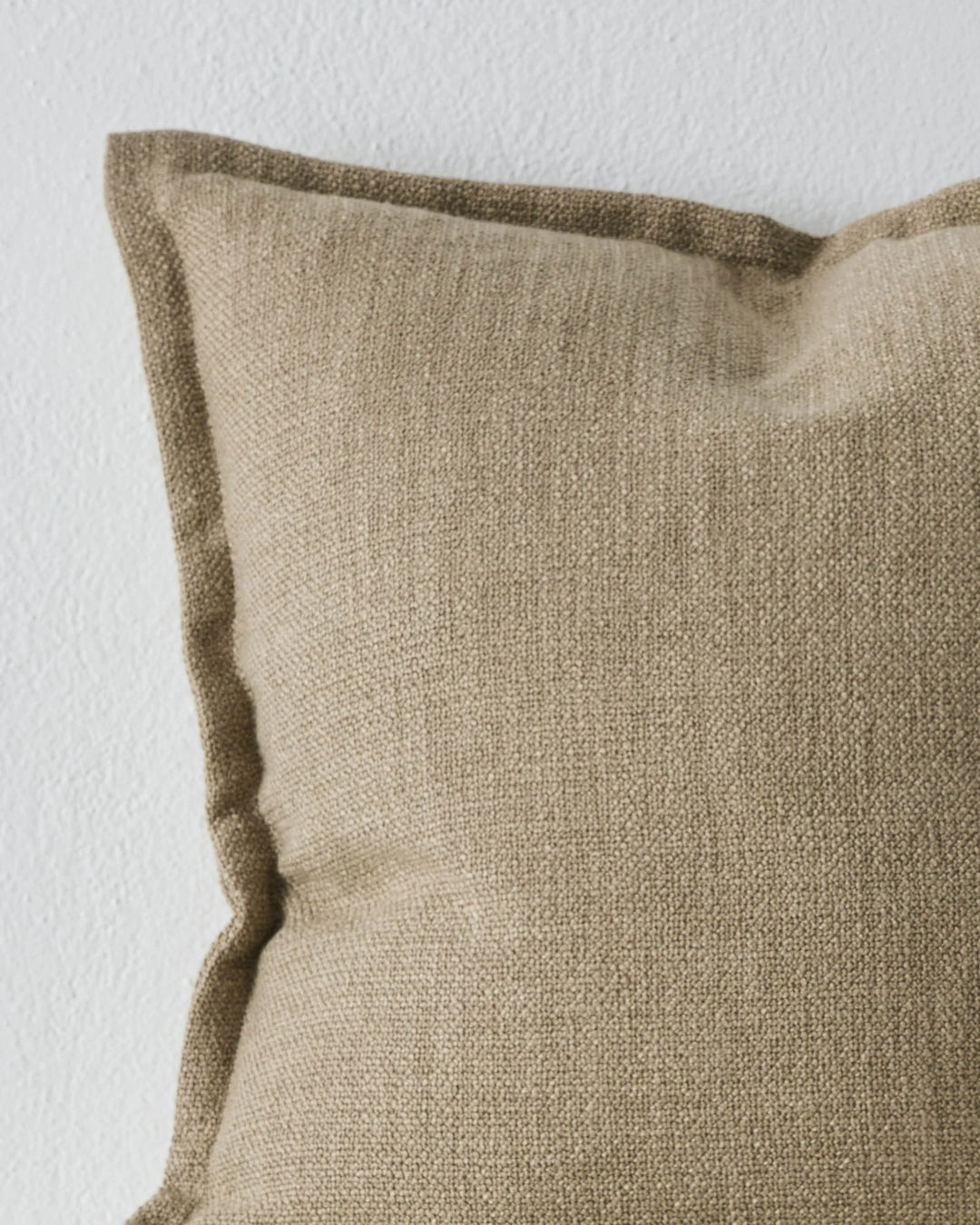 Figlio Fossil 50x50cm cushion close-up, light taupe woven polyester with chunky texture detail by Weave Home