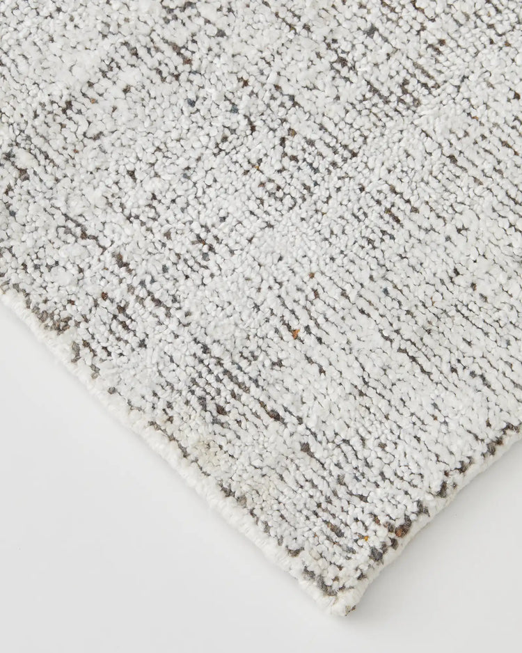 Matisse Marble rug detail view showing marled plain weave texture in light grey salt-and-pepper viscose blend, 2m x 3m, by Weave Home