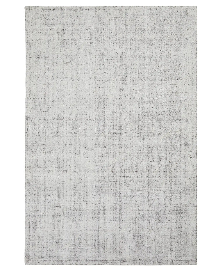 Matisse Marble low traffic rug in light grey viscose blend with marled texture and cotton braided edge by Weave Home