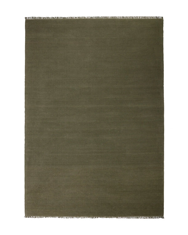 Emilio Kale high traffic rug in deep forest green linen, flat-weave construction with raw fringe edges, by Weave Home