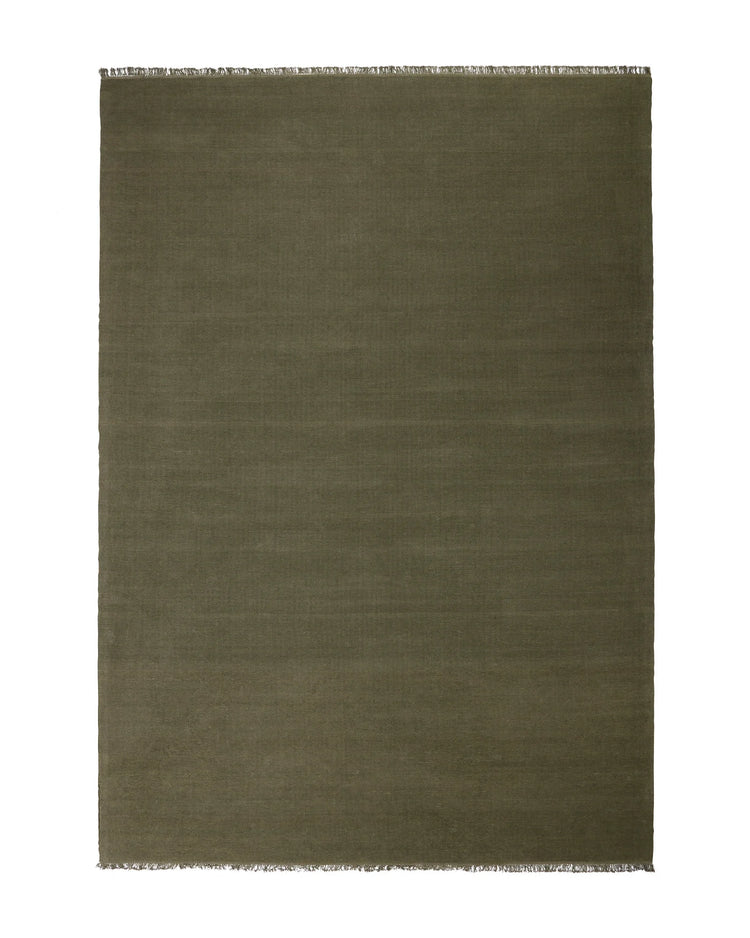 Emilio Kale high traffic rug in deep forest green linen, flat-weave construction with raw fringe edges, by Weave Home