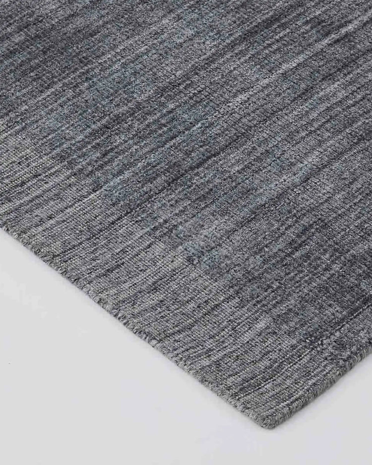 Travertine Pewter rug detail, showing hand-woven viscose blend texture with marbled appearance by Weave Home