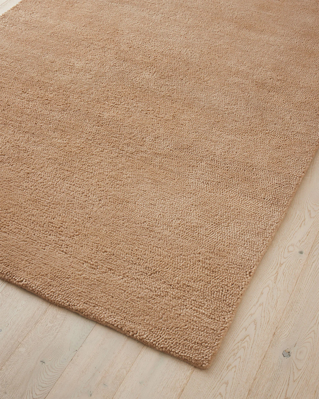 Valencia Camel rug corner detail, plush woven NZ wool in warm golden tone by Weave Home