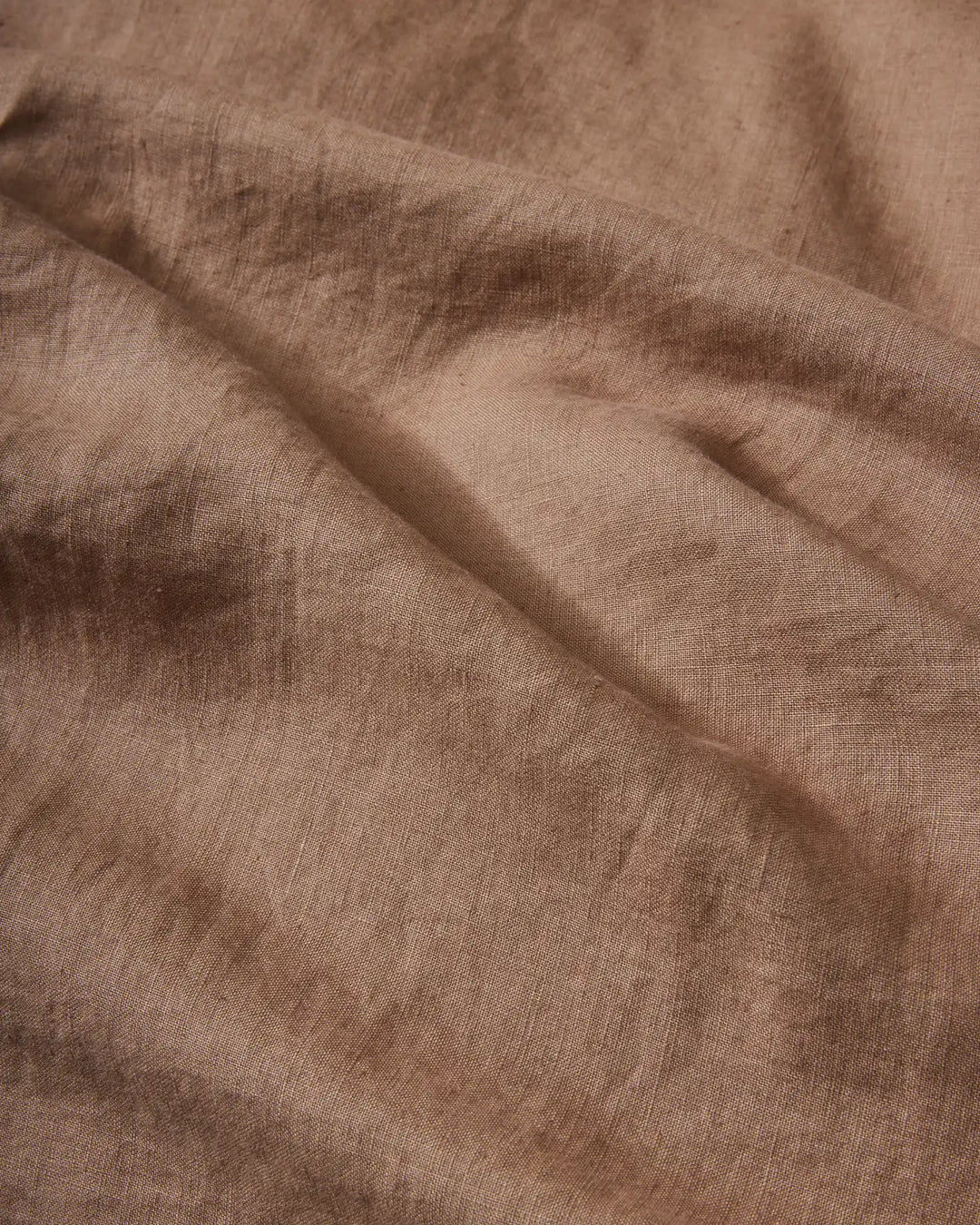 Ravello Fitted Sheet in Biscuit, close-up detail of soft European linen weave with relaxed, lived-in texture by Weave Home