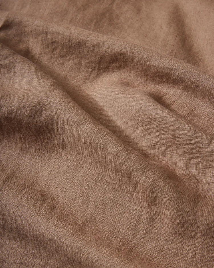 Ravello Fitted Sheet in Biscuit, close-up detail of soft European linen weave with relaxed, lived-in texture by Weave Home