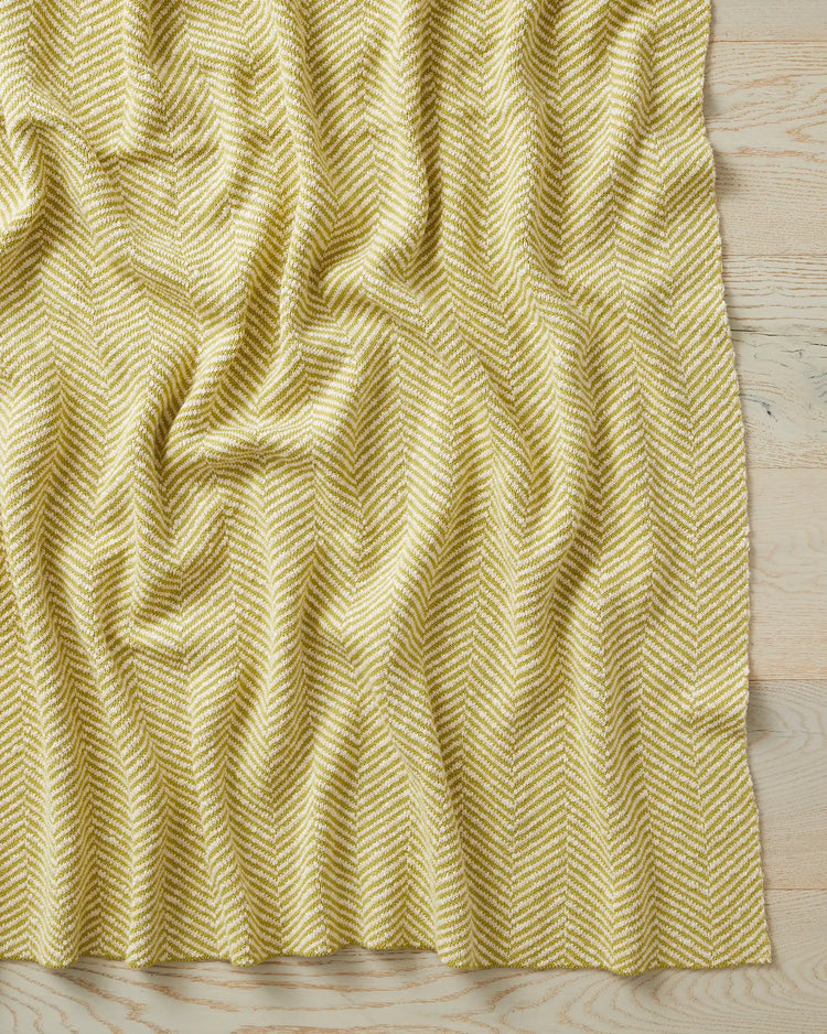 Solano throw in Zest, citrus yellow herringbone cotton with bouclé reverse, 125x150cm by Weave Home