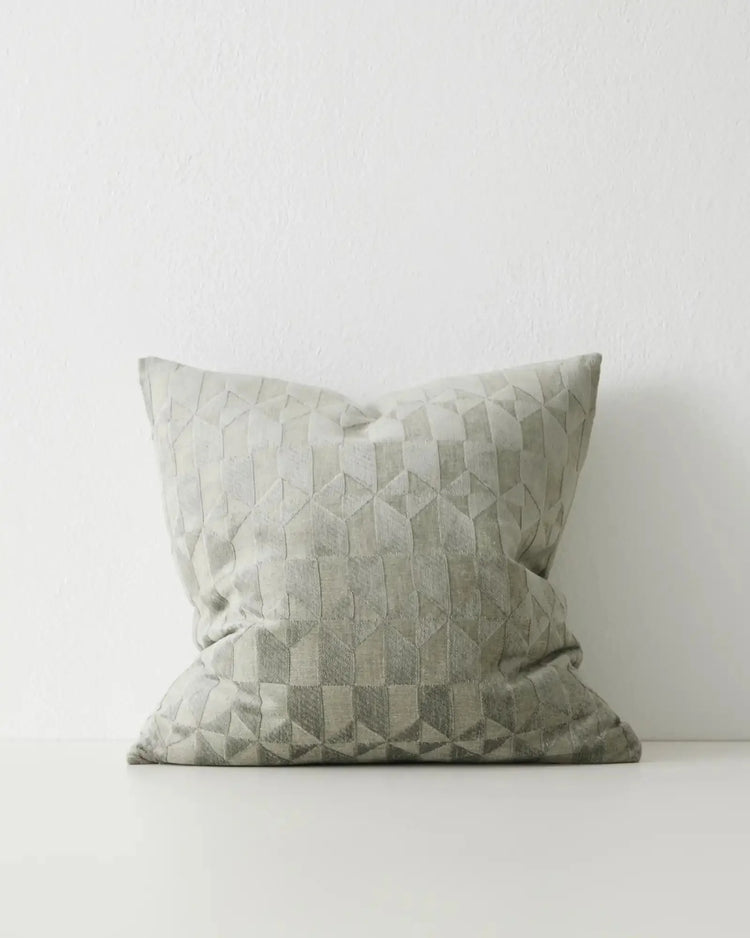 Marina Laurel 50x50 viscose blend cushion in soft green with geometric quilted pattern and matte-to-sheen contrast by Weave Home