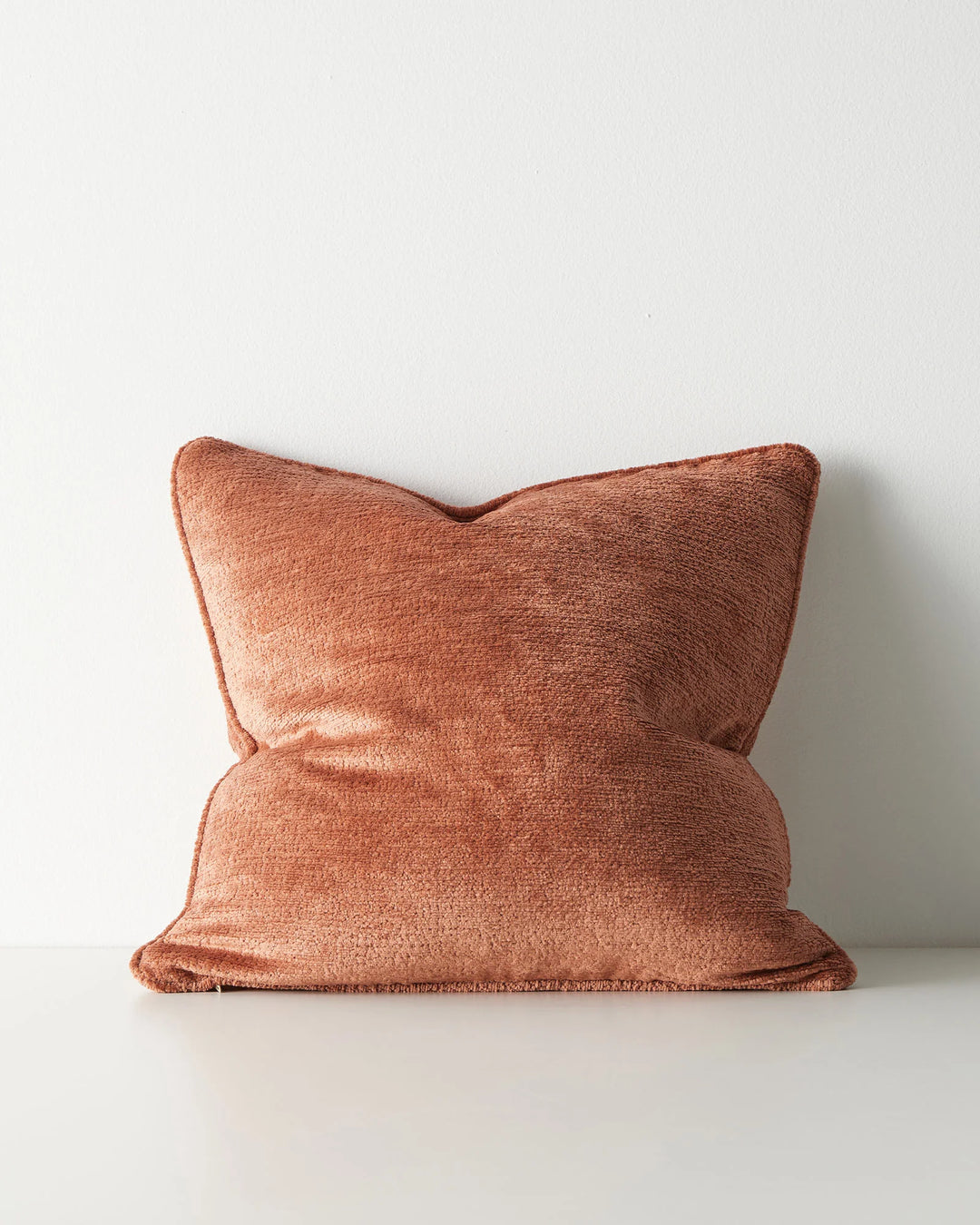 Tempo Spice 50x50 cushion in rich terracotta with chunky chenille texture and piped edging by Weave Home