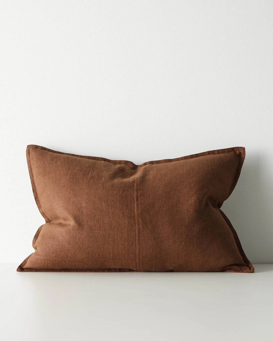 Como Henna linen lumbar cushion 40x60cm in warm reddish-brown, stone-washed European linen with tailored piping by Weave Home