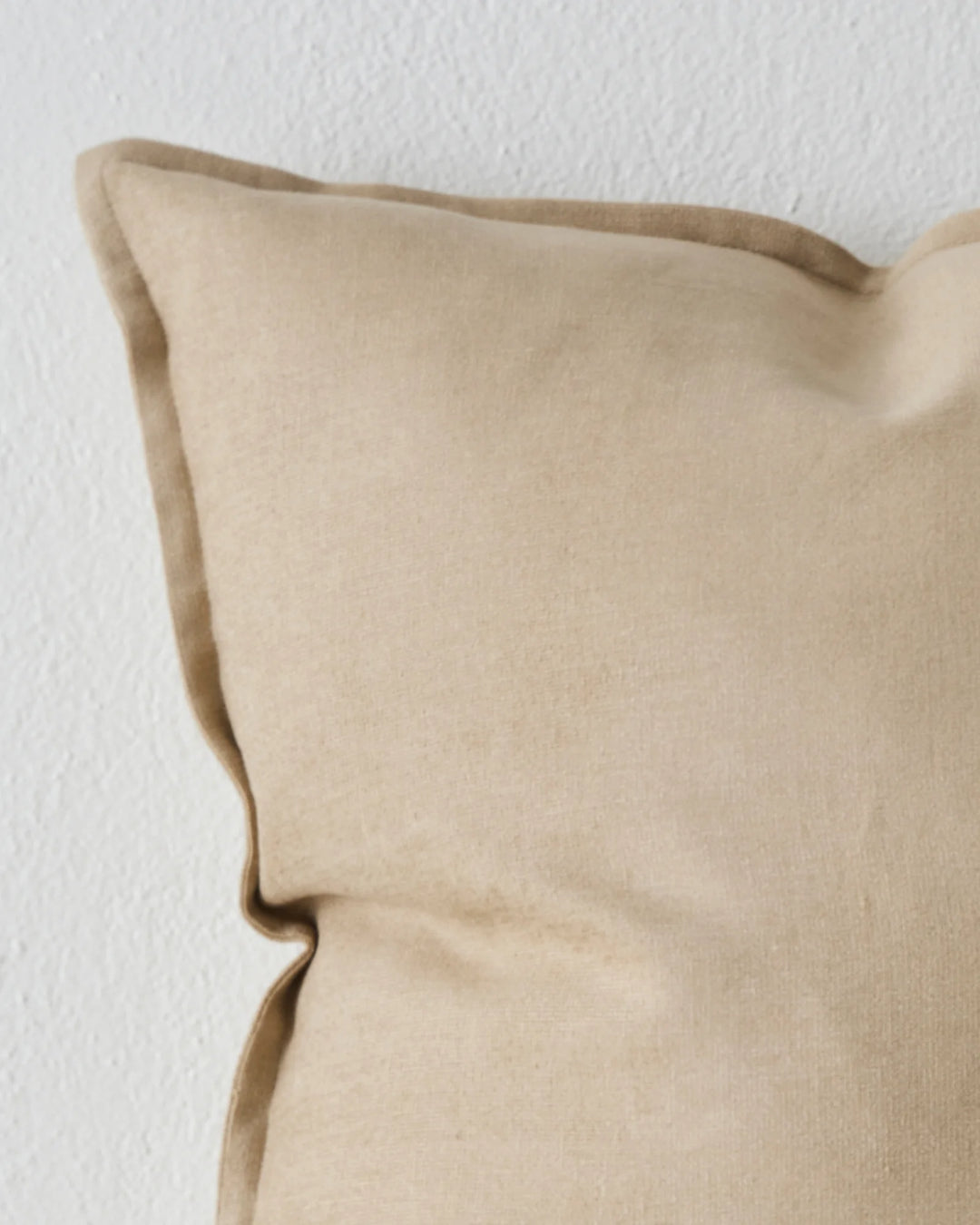 Fiore Ecru lumbar cushion close-up, linen viscose blend with soft piping detail and luminous finish by Weave Home