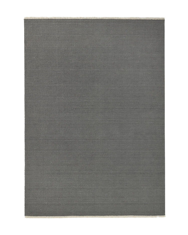 Fabien Echo textured wool rug in medium grey with cream fringe border, chunky ribbed weave loop pile by Weave Home
