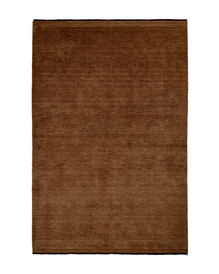 Silvio Sienna rug in reddish-brown, hand-woven with micro fringe border detail, by Weave Home