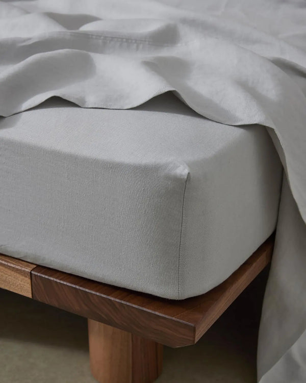 Ravello Fitted Sheet in silver European linen, corner detail showing deep pocket construction on double mattress by Weave Home
