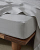 Ravello Fitted Sheet in silver European linen, corner detail showing deep pocket construction on double mattress by Weave Home